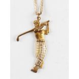 Gold golfing pendant and chain- with 9ct gold golfing figure and 14ct flat link chain - wt 4.