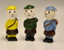 3x Carlton Ware Dunlop Style Caddie Golfing figures - various coloured hand painted glazed figures