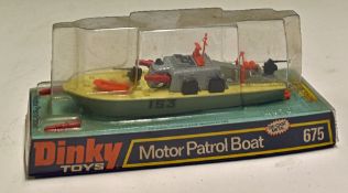 Dinky Toys Diecast Model 675 Motor Patrol Boat with missiles on carded plinth with plastic casing