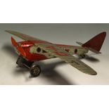 Mettoy K2010 Tinplate Clockwork Aircraft made in Great Britain silver with red decals, wear in