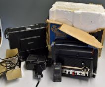 Chinon Sound 8000 Film Projector comes with original box (poor), plus a selection of reels with film