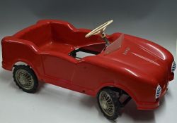 1970s Red Pedal Car Toy complete with window screen, headlights etc. measures 32 inches