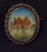 Indian Miniature Painting Brooch depicts a view of a building, within decorative white metal