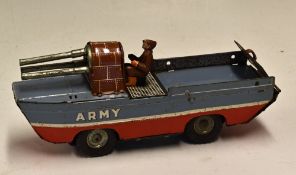 K Toys (Japan) Tinplate Friction Amphibious 'Army' Vehicle with driver and rotating guns when