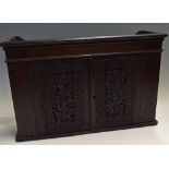 Hindu Incense Cabinet a wooden cabinet with carved doors, measures 62x37x17cm approx.