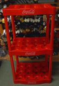 Coke Cola Shop Display Stand a Three tier plastic stand which holds 36 2ltr bottles (great storage