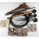 Collection of various trout fly reels and alloy fly tins with both salmon and trout flies and 2x