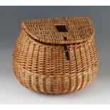 Large Pot- bellied English wicker creel: with slot to lid, canvas shoulder strap and leather lid