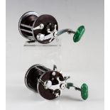 2x Vintage Penn Salt Water Fishing Reels - Penn Jigmaster 500 and No145 Squidder, both with chrome