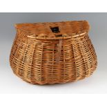 Large Pot- bellied English wicker creel: with slot to lid, canvass shoulder strap and leather lid