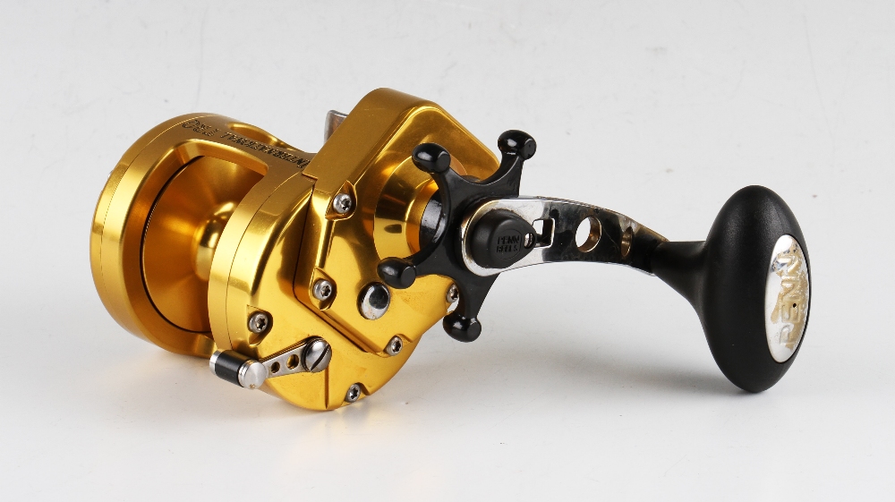 Penn International TRQ 200X Torque Multiplier Fishing Reel finished in gold, anodised, machined