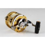 Penn International 50 Big Game Fishing Reel in gold, lever drag with ratchet, some scratches to