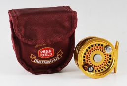 Fine Penn International 1.5 gold anodised trout fly reel and line - 3"dia x 1", Ser no E950344, c/