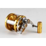 Vintage C.1980s Penn International 6 Big Game Fishing Reel in gold, lever drag, marked 4.056.246,