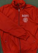 Manchester United Red Jacket with 'MUFC' and club emblem stitched in white to front, windbreaker
