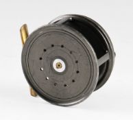 W R Pape Newcastle upon Tyne salmon reel: 3 1/2" dia - black handle and brass foot, wide drum smooth