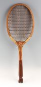 The Volley swallow tail racket with convex throat with original two tone, red / white natural gut