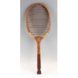 The Volley swallow tail racket with convex throat with original two tone, red / white natural gut
