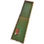 An antique mahogany folding "Bagatelle" board in original condition - baize covered base. box and