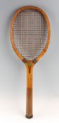 The Eclipse regular wooden tennis racket with concave throat double centre mains and red/ white