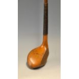 Fine A Bell elegant drop toed golden fruit wood driver - with good period hide replacement grip.