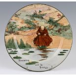 Royal Doulton fishware plate decorated by Noke, 10.5" diameter, single monk fishing on pond,