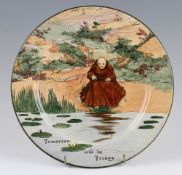 Royal Doulton fishware plate decorated by Noke, 10.5" diameter, single monk fishing on pond,