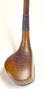 Robertson Carnoustie "Leader" patent no 10989 beech wood brassie: with full one piece integral brass