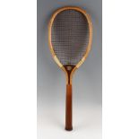 Spalding Model D.H. wooden tennis racket with convex throat with double centre mains and red natural