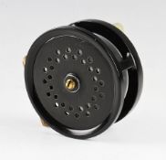 A Carter & Co London salmon reel: 4" Perfect style. Smooth brass foot, strapped tensioner still