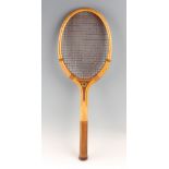 The Driver wooden tennis racket with concave throat with original natural gut stringing. by N. I.