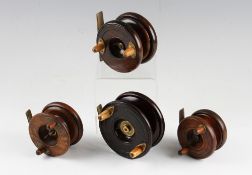 Selection of Nottingham wooden and brass star and strap back reels: To include W Gamage Holborn 2.