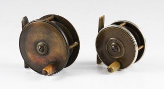 2x Army & Navy Brass Reels: 2.25" silver rimmed with bone handle having some play in the reel