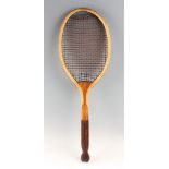 Queen fish tail racket with convex throat with original two tone, red / white natural gut stringing.