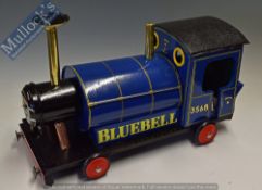 Children’s Sit on Bluebell Train in blue and black with metal and wood components, measures