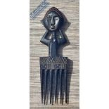 African Wooden Comb - African warrior having a 6-prong comb mounted in a glazed display frame 46 x