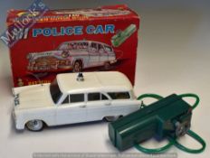 Marx Toys Battery Operated M1 Police Car – Remote Control, in white with green remote, in original