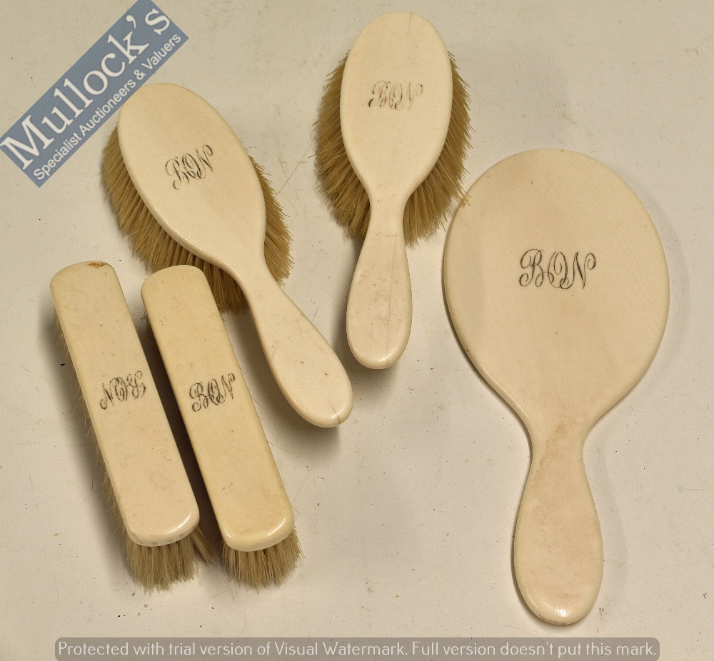 Late 19th Century Table Dressing Set to include hand mirror and four brushes, all solid ivory backed