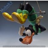 c.1980s Disney ‘Goofy’ Shop Display of Goofy hanging on trapeze, a type of resin, measures 40 x 36 x