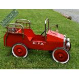 Child’s Pedal Fire Engine in red with ladders and hose rear, bell to front, wood and metal