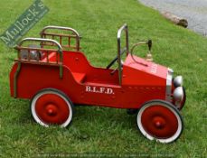 Child’s Pedal Fire Engine in red with ladders and hose rear, bell to front, wood and metal