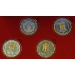 Presentation set of 4 medals commemorating the Manchester United achievement of the Treble in 1998/