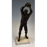 Spelter Figure in throwing ball position mounted on a marble base 30cm high