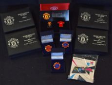 Collection of Manchester Utd presentation badges, each boxed in individual small presentation