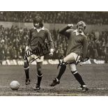 George Best and Dennis Law Signed Football Print in black and white with signatures in ink to the