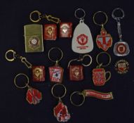 Manchester United key rings with miniature books attached - each has fold out b&w player photographs