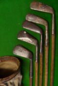 5x Alex Patrick Leven irons and golf bag – mashie, jigger, an iron, diamond back mid iron and an L