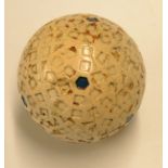 The Harlequin style square and triangular dimple golf ball c.1930 with 8x hexagonal coloured