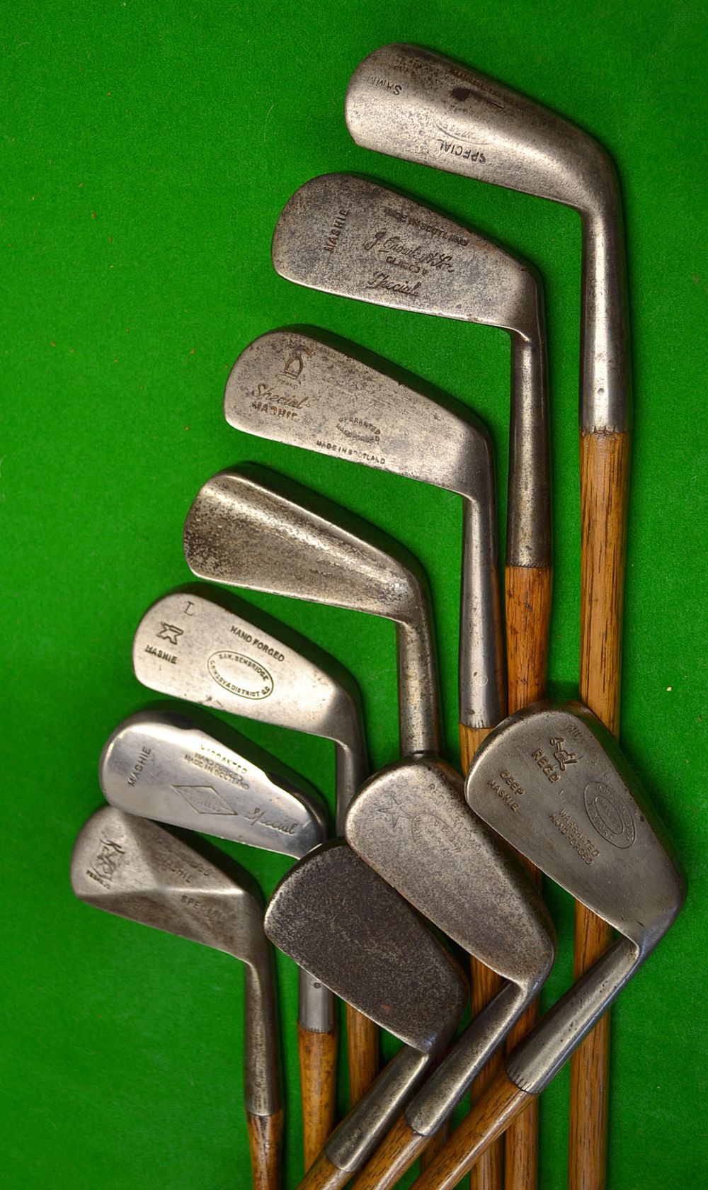 10x Assorted Irons mainly mashies by various makers including Trueline, Pegasus Diamond back