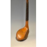 Fine A Bell elegant drop toed golden fruit wood driver – with good period hide replacement grip.